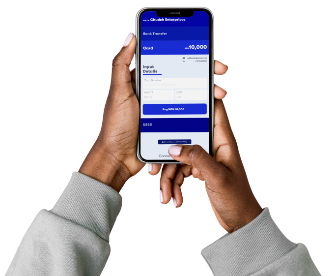 hand holding mobile checkout